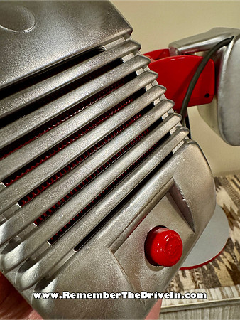 Closeup of a SPECO drive-in set on a short stand